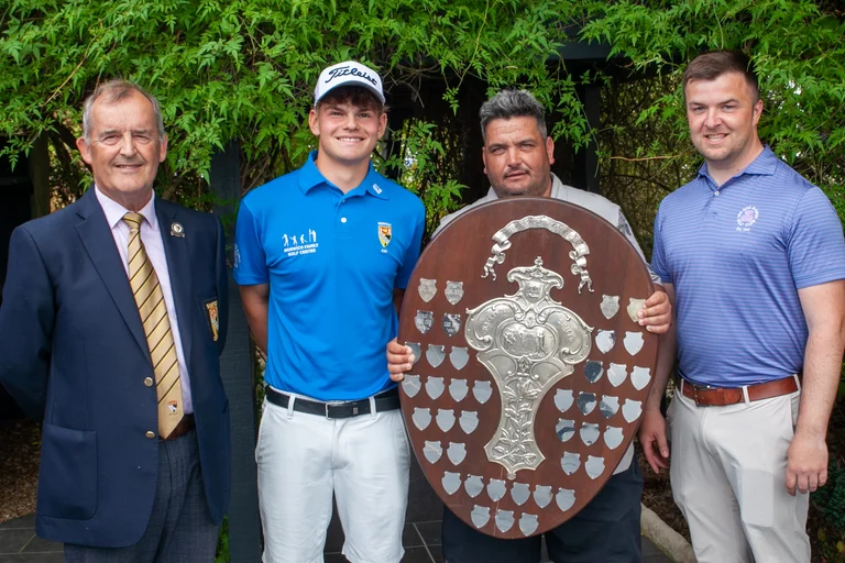 NCGU president Stuart Goodman presents the shield to team trophy winners, Thetford – Sully Goddard, Danny Loveday and Ed Dimambro